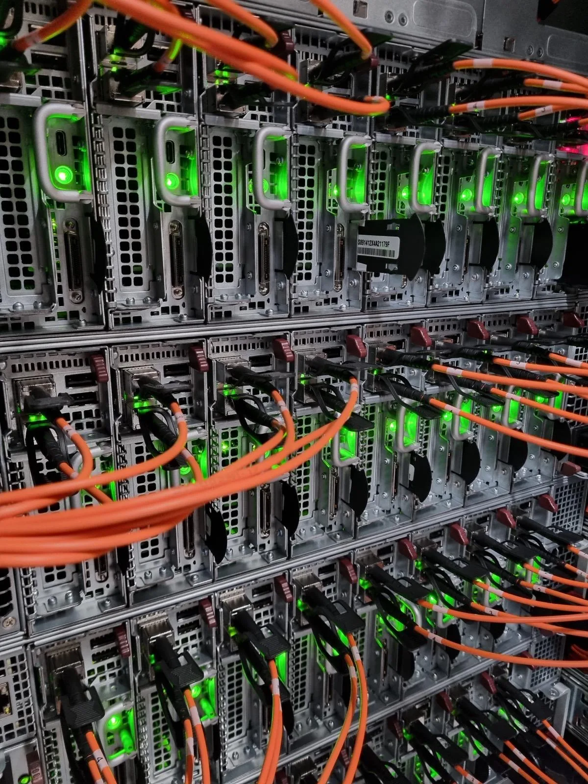 Close-up of compute nodes in a Serverside.com rack with fiber cabling and status LEDs